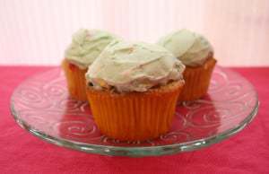 Three Lucky Charms Cupcakes on plate Three Lucky Charms Cupcakes on plate