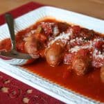 Veggie tomato sauce with chicken sausage on a platter