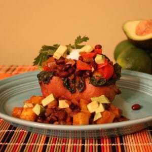 Pineapple Black Bean Stuffed Sweet Potatoes on plate