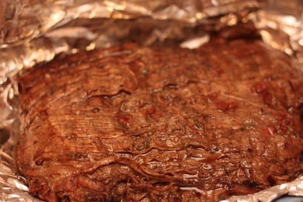 Flank Steak wrapped in foil after grilling