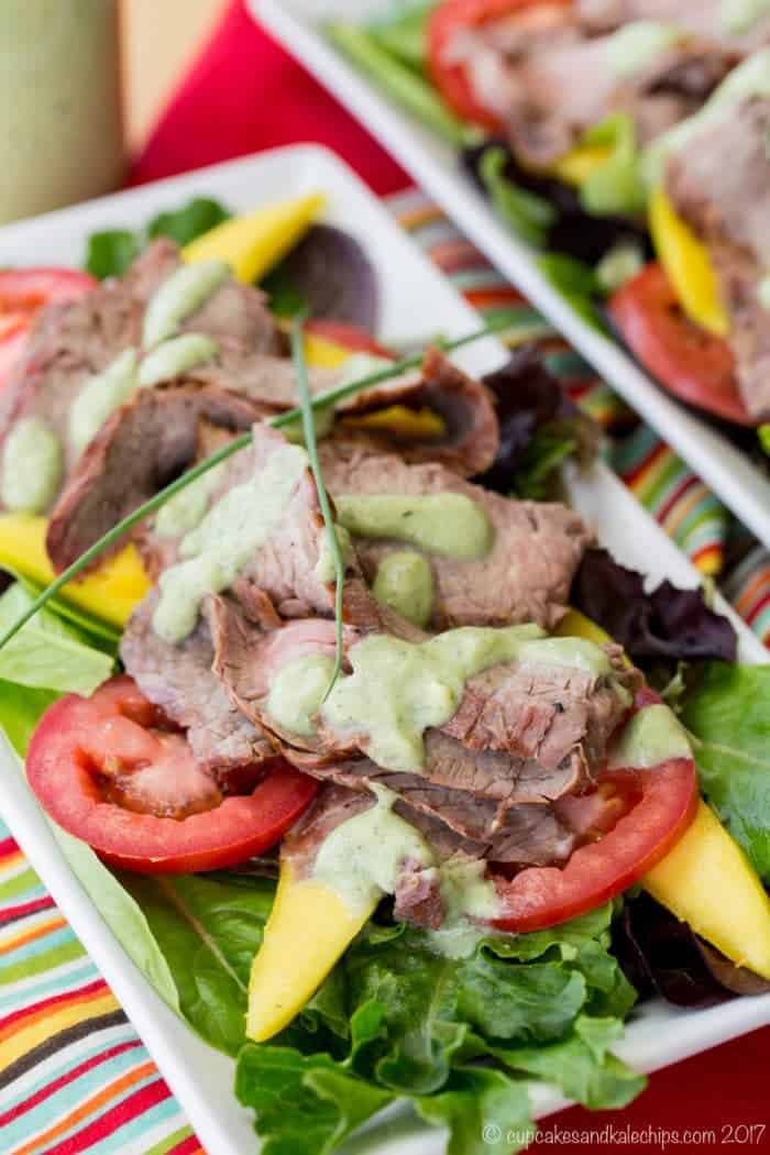 Mixed Greens topped with leftover steak, mango and tomato slices, and avocado ranch dressing