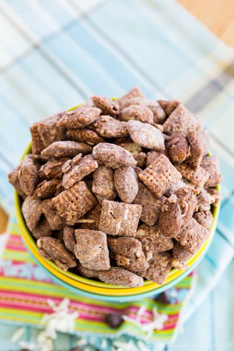 Looking down into a bowl of Almond Joy mudy buddies snack mix.