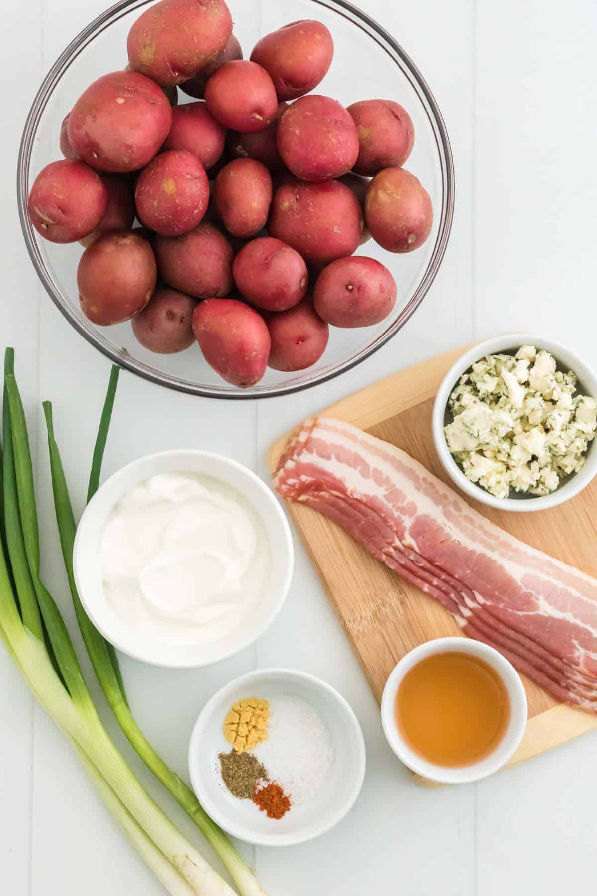 The ingredients for healthy blue cheese bacon potato salad.