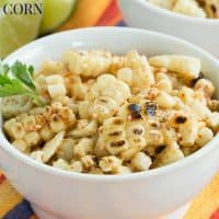 A bowl of charred corn kernels garnished with cilantro.