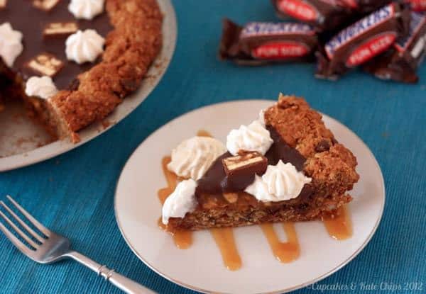 Monster Snickers Pie - a giant monster cookie crust and layers of caramel, peanuts, and chocolate ganache, this is the ultimate dessert recipe! | cupcakesandkalechips.com | gluten free