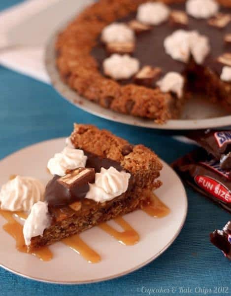 Monster Snickers Pie - a giant monster cookie crust and layers of caramel, peanuts, and chocolate ganache, this is the ultimate dessert recipe! | cupcakesandkalechips.com | gluten free