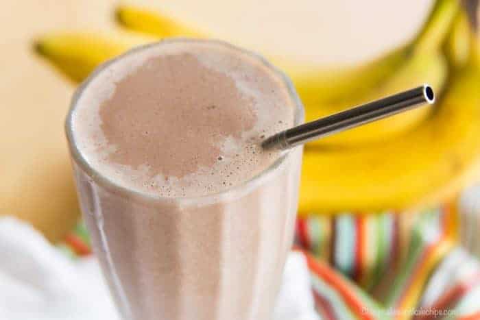 Top half of a Peanut Butter Chocolate Banana Smoothie in a glass