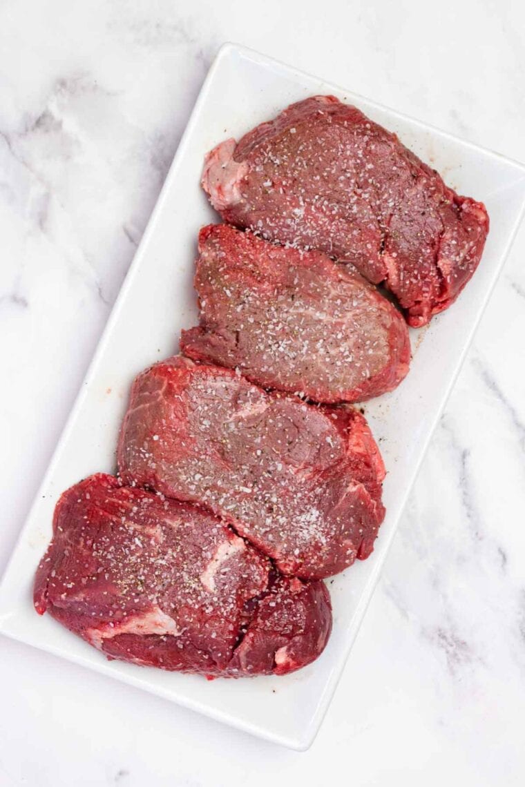 Filet mignon seasoned with salt and pepper