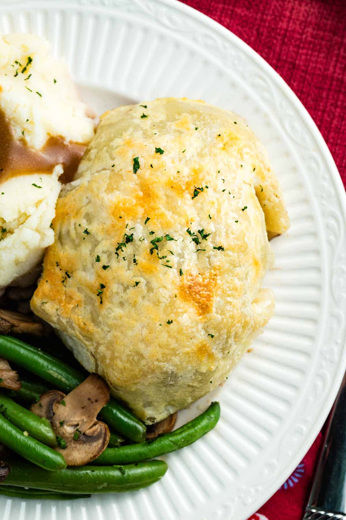Close up of a Individual Beef Wellington on a plate