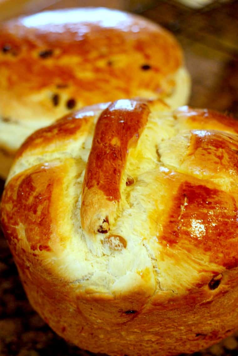 Loaves of paska, one with a cross on top