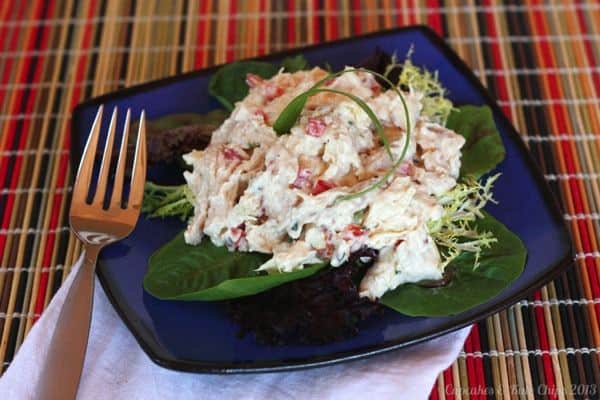 Asian-style pineapple chicken salad on a plate.