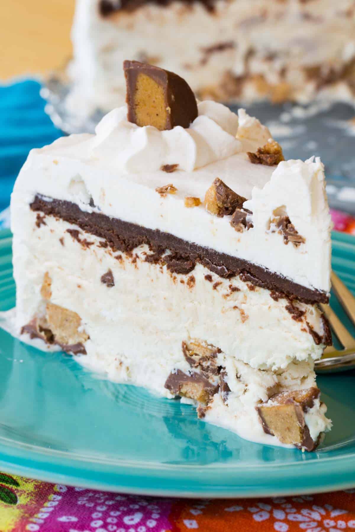A thick slice of Reese's Ice Cream Cake on a plate.