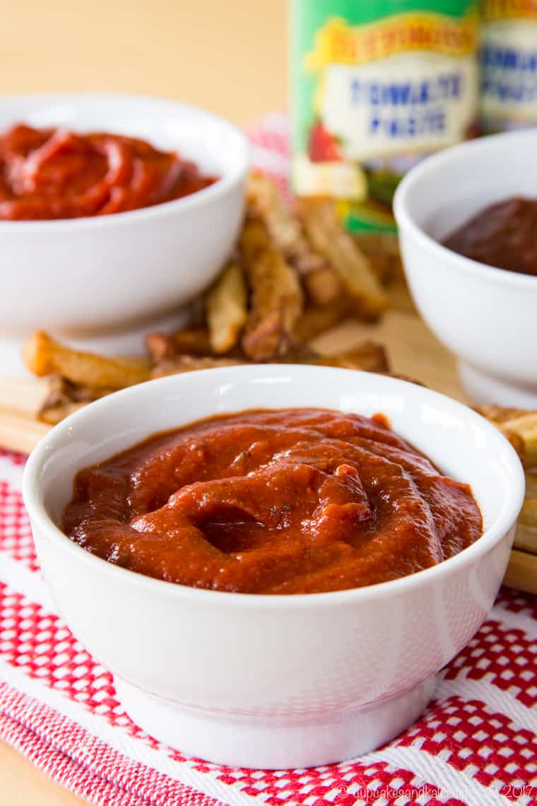 Bowls of homemade ketchup made with tomato paste