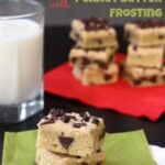 Chocolate chip sugar cookie bars with peanut butter frosting on top.