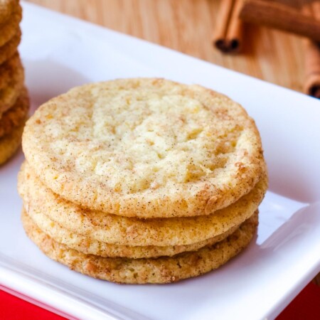 Orange Snickerdoodles on a white rectangular platter