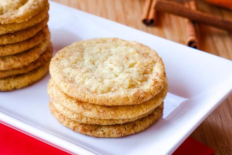 Orange Snickerdoodles on a white rectangular platter