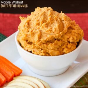A bowl of Maple Walnut Sweet Potato Hummus