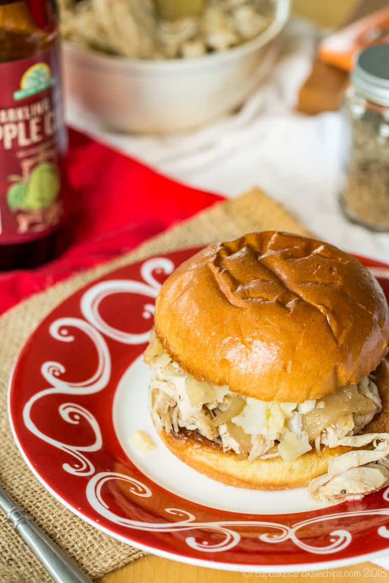 Slow Cooker Apple Cider Pulled Chicken Sandwiches on a roll