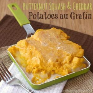 Cheesy Butternut Squash Potatoes au Gratin is a gluten free side dish, with creamy cheddar cheese sauce and Parmesan cheese baked over sliced butternut squash and potatoes. | cupcakesandkalechips.com