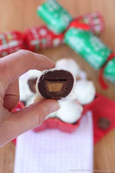 Gluten free, grain free, Flourless Chocolate Peanut Butter Cup Cookie Dough Truffles, made with a secret ingredient, plus added protein and fiber for healthy goodness! | cupcakesandkalechips.com | 