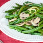 Lemon Green Beans and Mushrooms in a white serving bowl