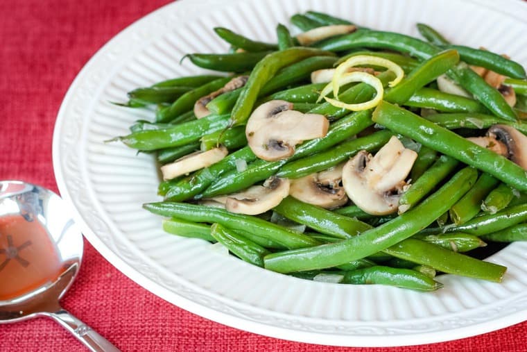 Lemon Green Beans and Mushrooms in a white serving bowl