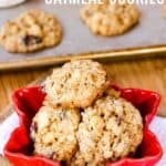 Gluten Free Oatmeal Cookies in a red snowflake-shaped dish with text overlay on the image that says "White Chocolate Cranberry Oatmeal Cookies".