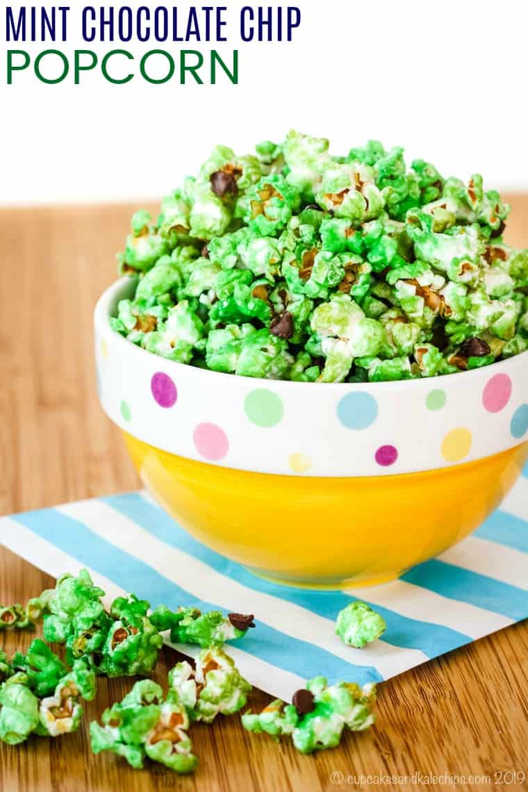 Green Popcorn with Chocolate Chips  overflowing from a yellow bowl