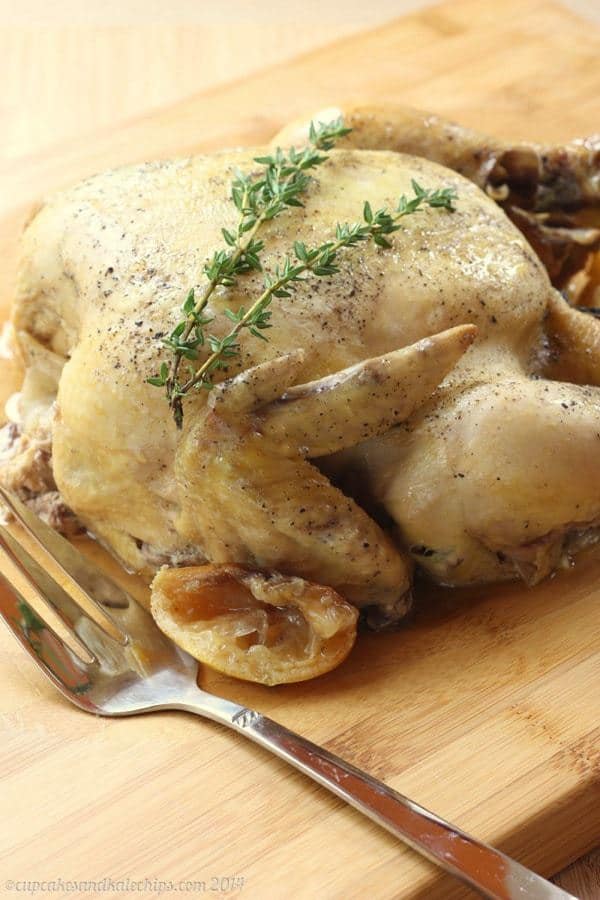 Whole Roasted Chicken from the Crockpot with lemons and herbs