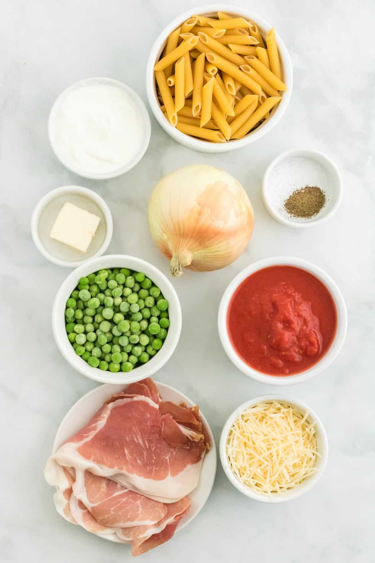 The ingredients for penne with tomato cream sauce.