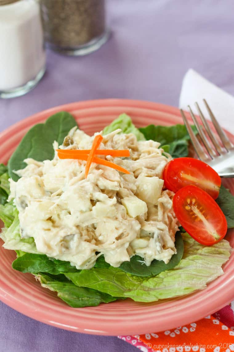Greek yogurt chicken salad with apples and blue cheese over lettuce
