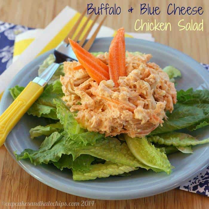 Buffalo Chicken Salad with blue cheese on top of fresh greens.