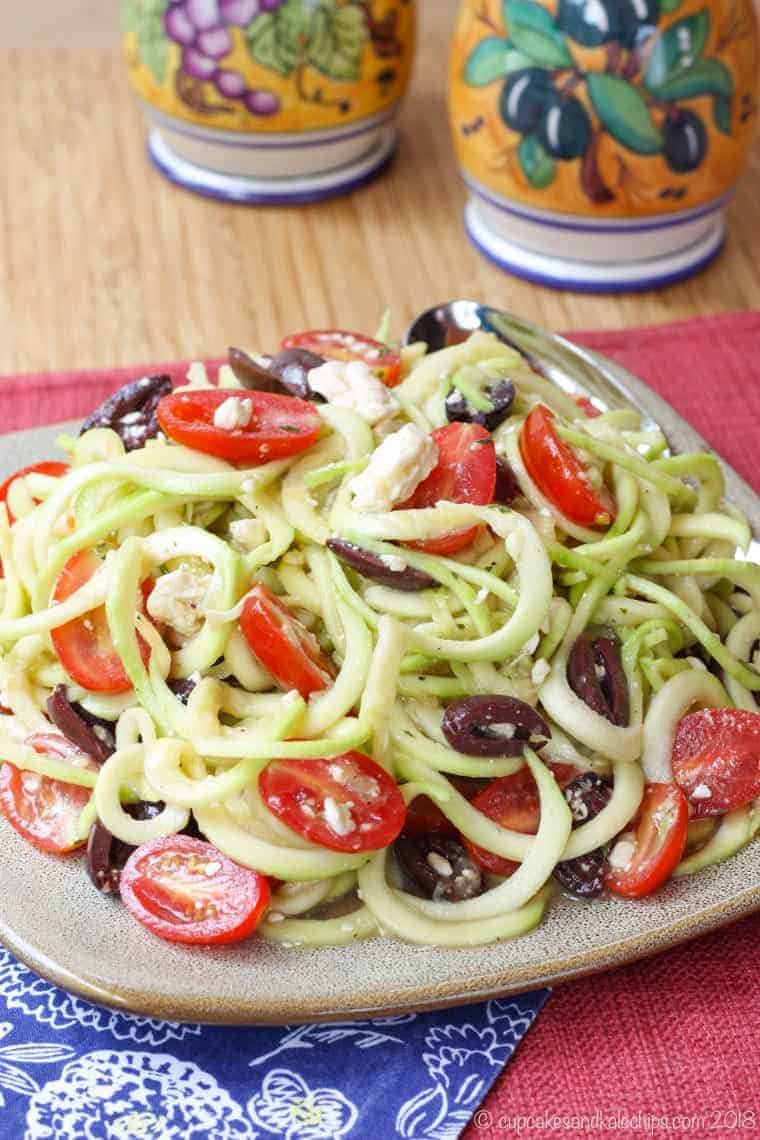 A plate of Greek Salad made with zucchini noodles