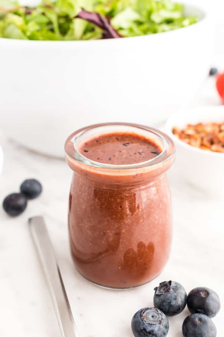 A small jar of Blueberry Balsamic Dressing