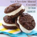 Ice cream sandwiches made with coconut gelato and two chocolate almond cookies.