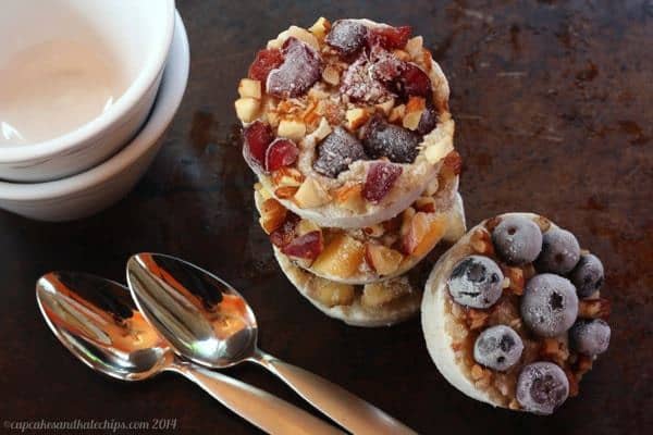 Freezer oatmeal cups make ahead breakfast stacked on a sheet pan ready to reheat