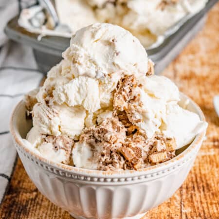 No-Churn Ice Cream with Nutella and Toffee Bits in a large white bowl.