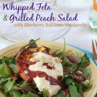 Grilled peach salad with blueberry balsamic vinaigrette.