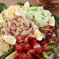 big serving bowl of turkey cobb salad