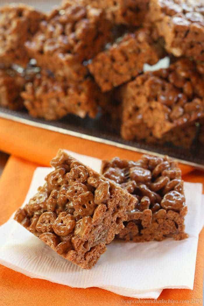 Two squares of Count Chocula Peanut Butter Marshmallow Treats on a napkin