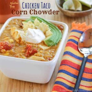 Gluten Free Chicken Corn Chowder with tomatoes, avocado slices, and sour cream.