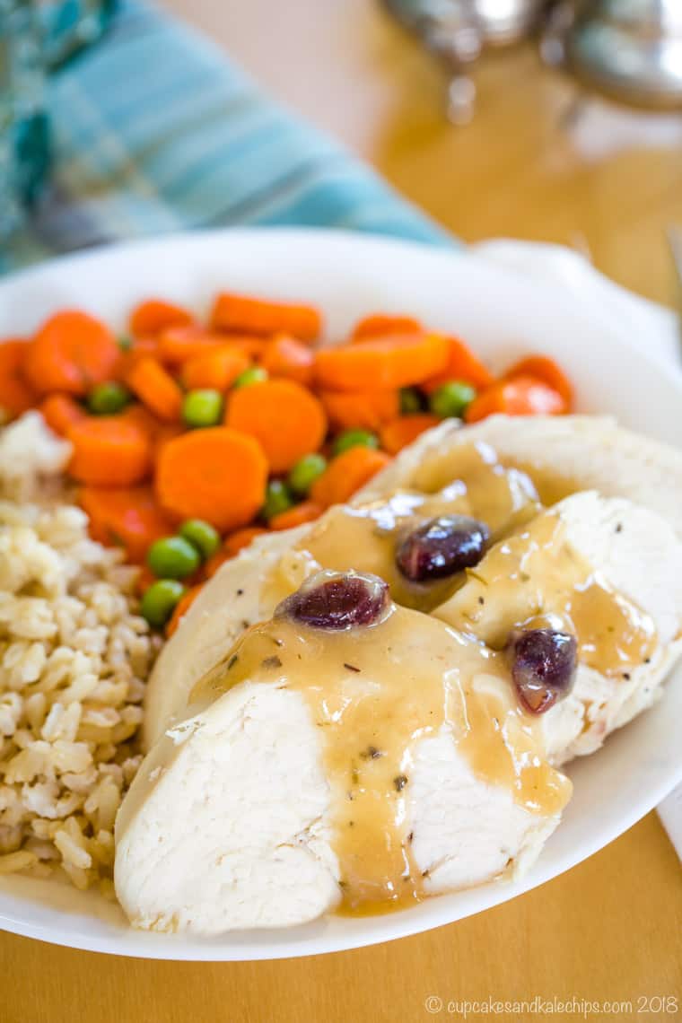 Gluten Free Apple Cider Gravy with Dried Cranberries on chicken