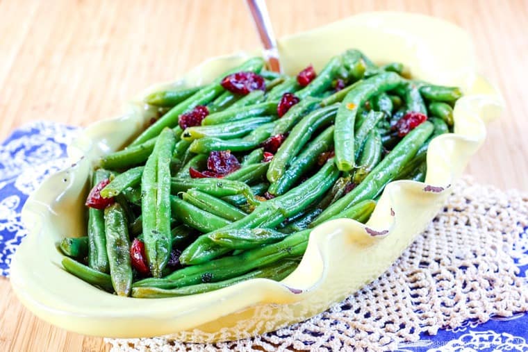 Glazed Fresh Green Beans in a yellow serving dish