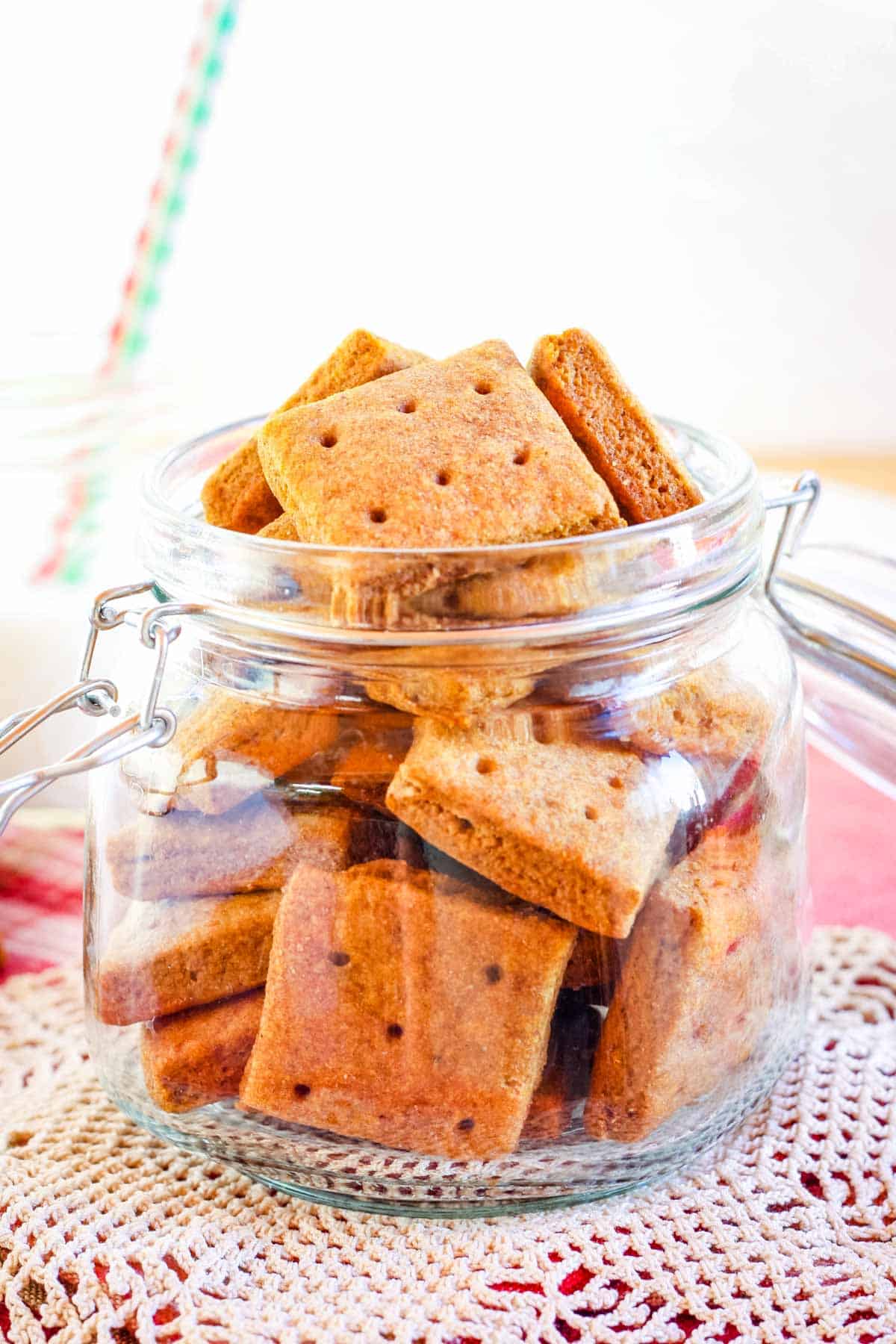 Graham crackers in a cookie jar with the lid open