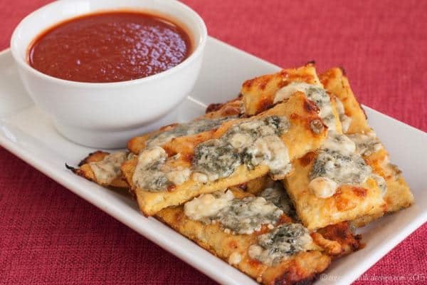 Blue Cheese Cauliflower Cheesy Bread Sticks with Buffalo Marinara Dipping Sauce - a crispy, gooey, spicy appetizer recipe that's low carb and gluten free!