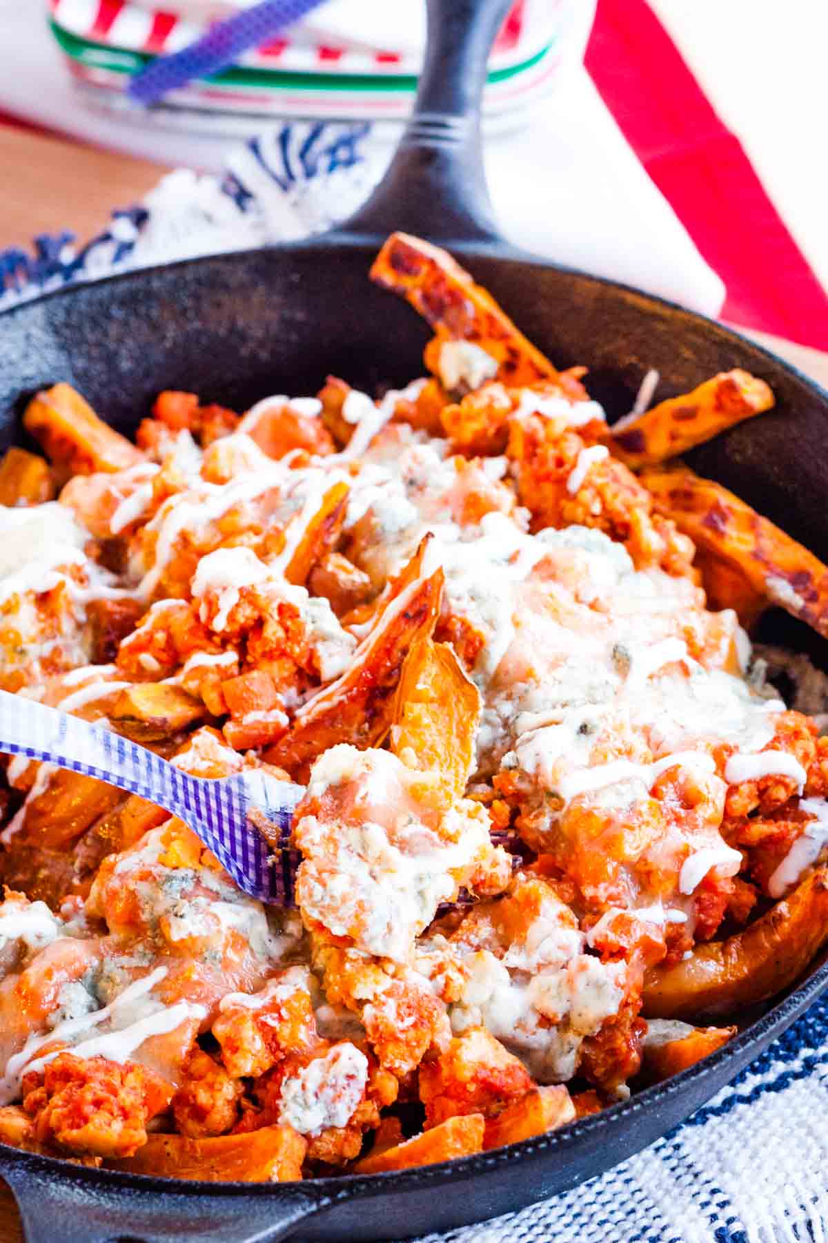 Crispy fries covered in cheese and mixed with ground chicken.