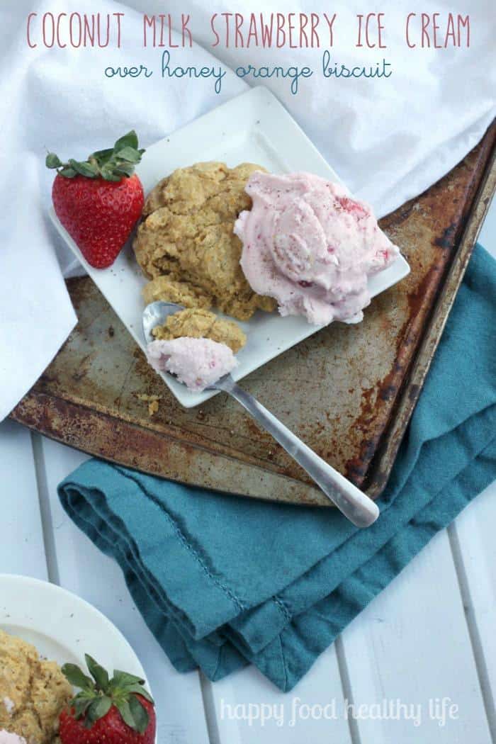 Plate of orange biscuits with strawberry ice cream.