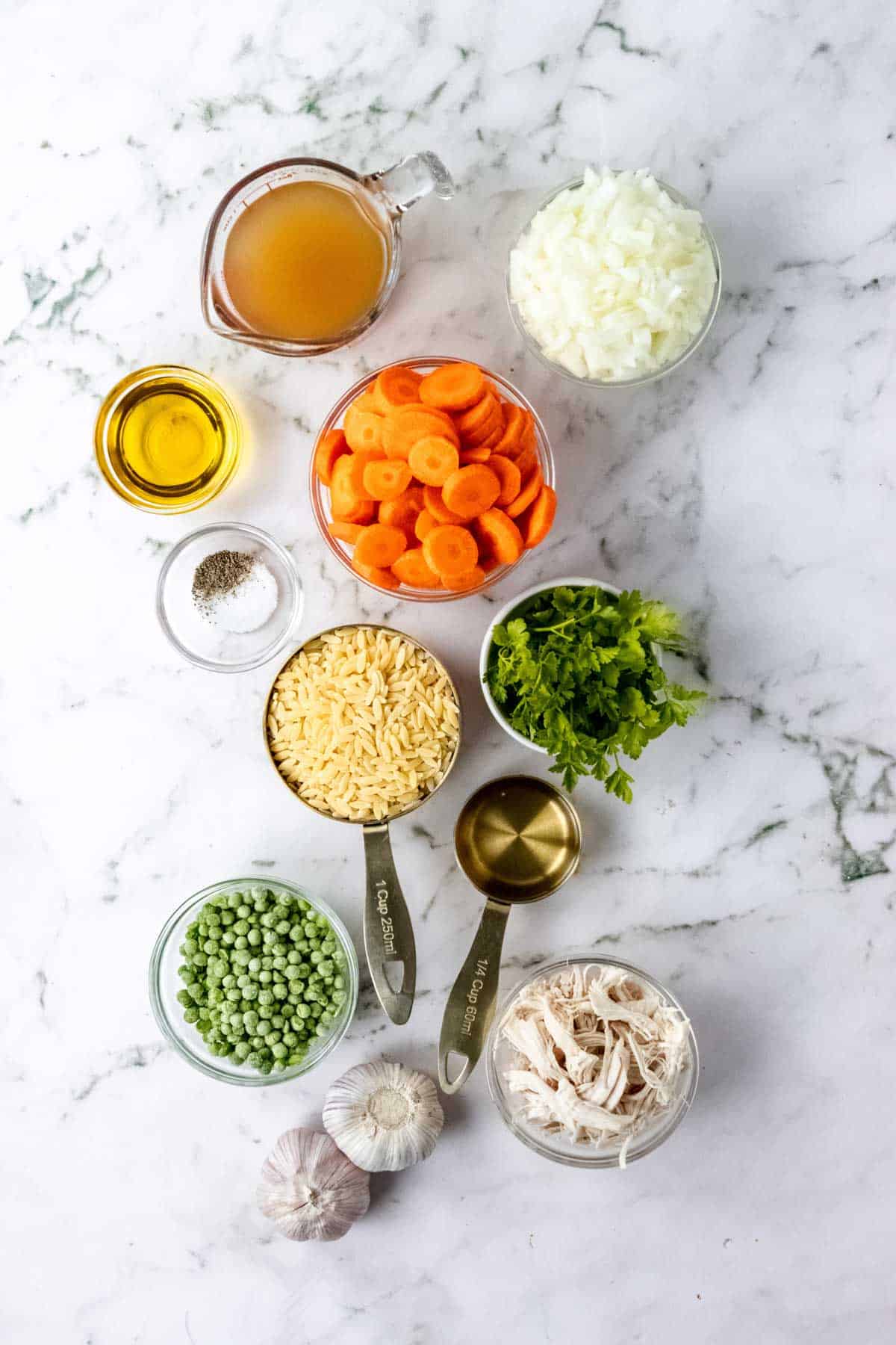 The ingredients for gluten-free chicken orzo soup.