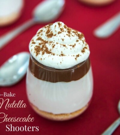 No-Bake Nutella Cheesecake Shooters - layers of cheesecake, chocolate hazelnut spread and whipped cream on top of a classic graham cracker or gluten free crust and topped with whipped cream are a simple, rich and elegant mini dessert perfect for a party! | cupcakesandkalechips.com