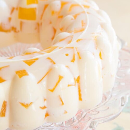 https://cupcakesandkalechips.com/wp-content/uploads/2015/03/Creamsicle-Jello-mold-recipe-600-1030-500x500.jpg